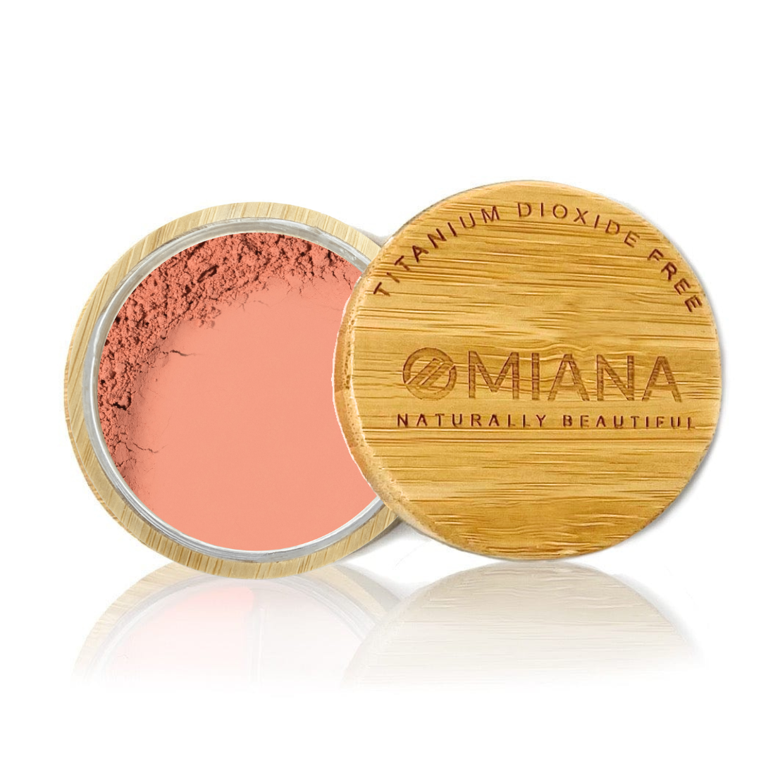 Omiana Loose Powder Mineral Blush Makeup in a bamboo container on a white background