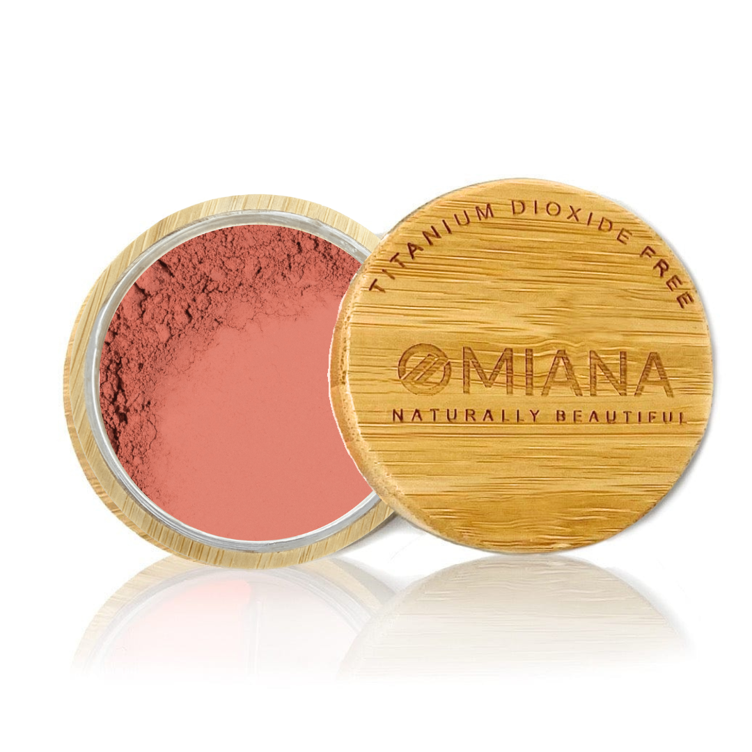 Omiana Loose Powder Mineral Blush Makeup in a bamboo container on a white background