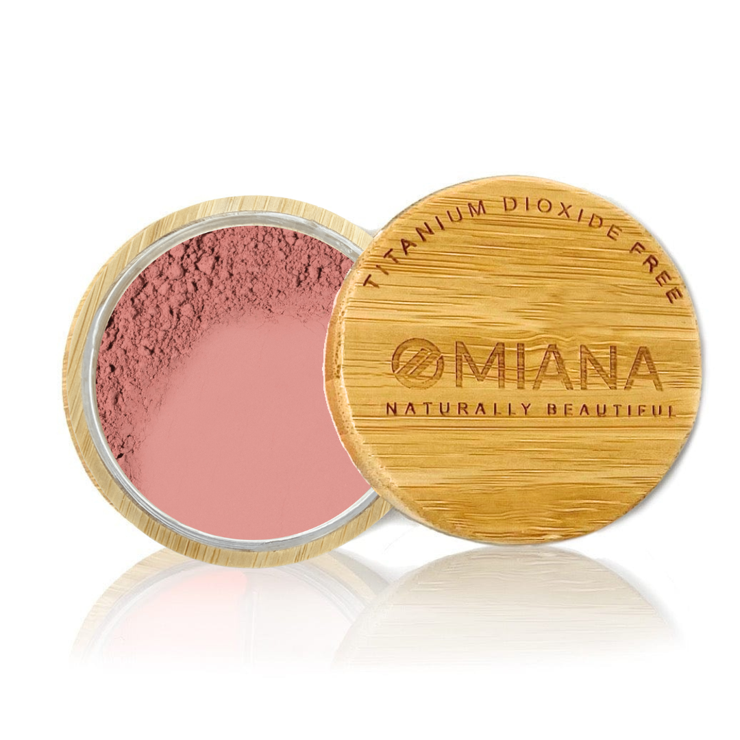 Omiana Loose Powder Mineral Blush Makeup in a bamboo container on a white background